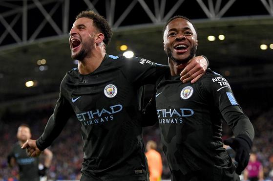  曼城客场逆转阿森纳延续英超不败神话